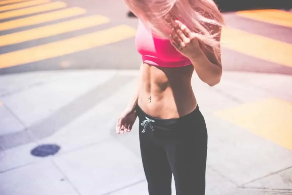 Woman with toned stomach after LA-EMS Body Sculpting Treatment Warminster
